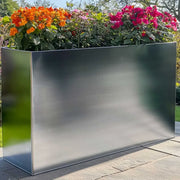Why Should I Choose a Tall Planter For My Space?